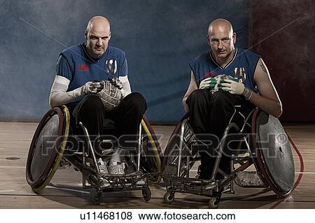 Stock Photo - Para rugby players in wheelchairs. Fotosearch