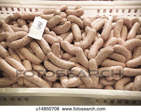 Parsley sausages in meat factory View Large Photo Image Stock Photo - Parsley sausages in meat factory. Fotosearch