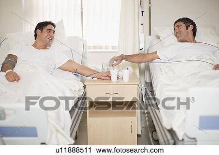 Patients talking in hospital beds View Large Photo Image Stock Image - Patients talking in hospital beds. Fotosearch