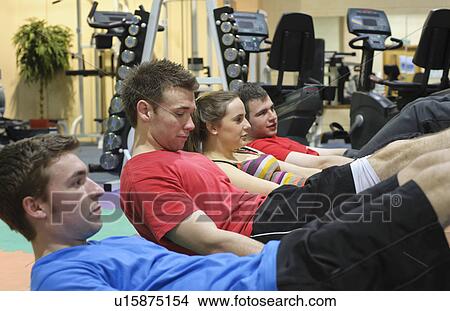 People exercising at gym View Large Photo Image Picture - People exercising at gym. Fotosearch