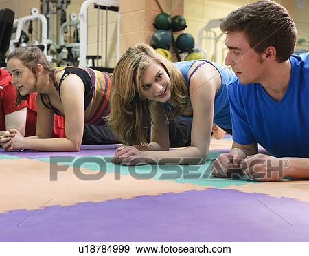 People exercising at gym View Large Photo Image Stock Photo - People exercising at gym. Fotosearch
