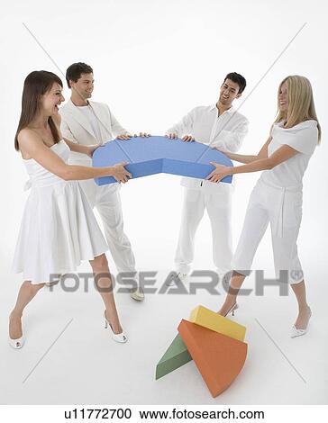 Stock Image - People fighting over pie chart. Fotosearch