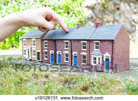 Person selecting model house View Large Photo Image Stock Image - Person selecting model house. Fotosearch