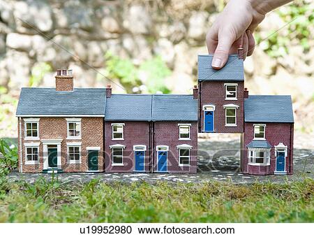 Person selecting model house View Large Photo Image Stock Image - Person selecting model house. Fotosearch