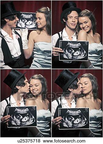 Photo booth picture of newlywed couple View Large Photo Image Stock Photo - Photo booth picture of newlywed couple. Fotosearch