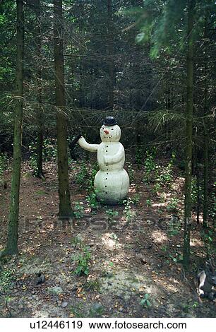 Plastic snowman in forest View Large Photo Image Stock Photo - Plastic snowman in forest. Fotosearch