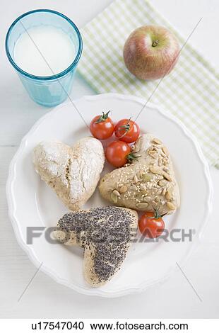 Plate of bread and tomatoes with milk View Large Photo Image Stock Image - Plate of bread and tomatoes with milk. Fotosearch