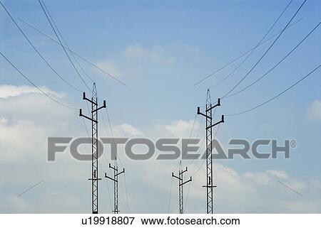 Stock Photo - Power lines against blue sky. Fotosearch