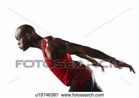 Profile of athlete lunging View Large Photo Image Stock Photo - Profile of athlete lunging. Fotosearch