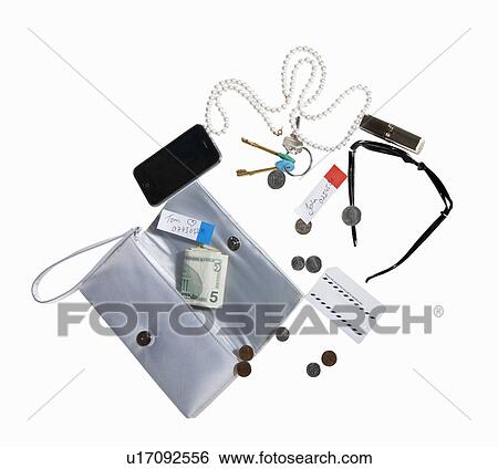 Purse with cell phone, money, jewelry View Large Photo Image Stock Photograph - Purse with cell phone, money, jewelry. Fotosearch