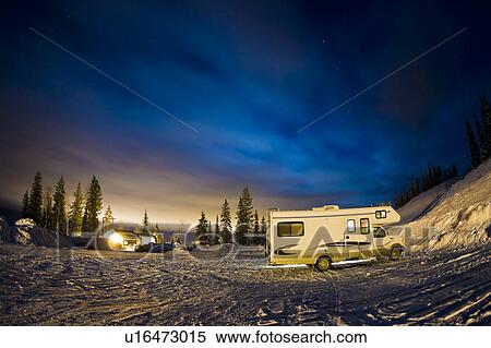 Recreational vehicle parked on hillside View Large Photo Image Stock Photography - Recreational vehicle parked on hillside. Fotosearch