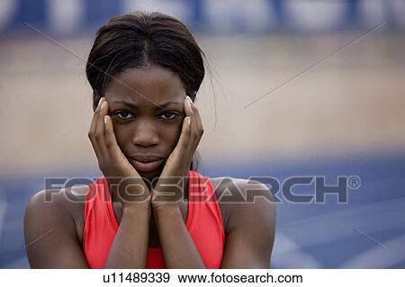Runner concentrating on track View Large Photo Image Stock Photo - Runner concentrating on track. Fotosearch