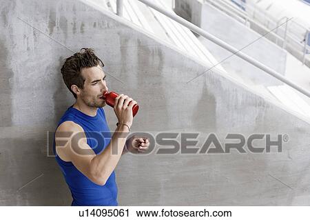 Runner drinking water View Large Photo Image Stock Image - Runner drinking water. Fotosearch