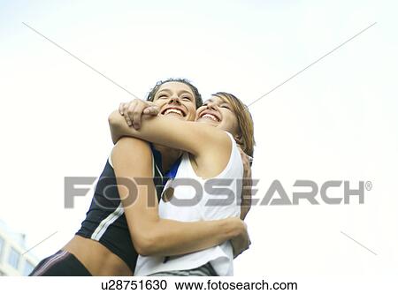 Runners celebrating with medals View Large Photo Image Stock Image - Runners celebrating with medals. Fotosearch