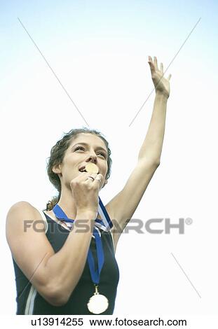 Runners celebrating with medals View Large Photo Image Stock Photography - Runners celebrating with medals. Fotosearch