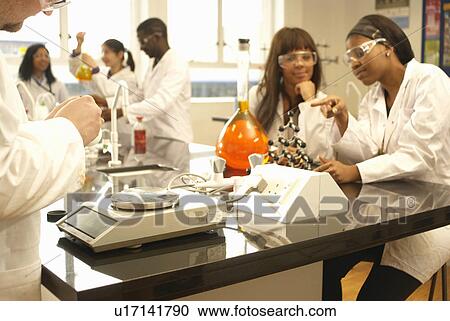 Scientists at work in lab View Large Photo Image Stock Image - Scientists at work in lab. Fotosearch