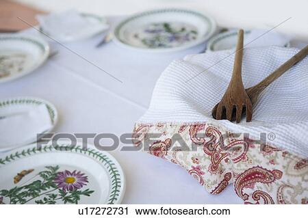 Serving spoons with towel and plates View Large Photo Image Stock Image - Serving spoons with towel and plates. Fotosearch