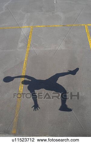 Shadow of basketball player jumping View Large Photo Image Stock Image - Shadow of basketball player jumping. Fotosearch