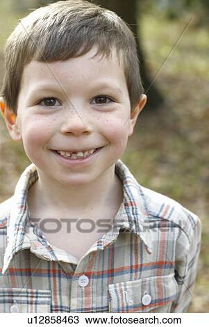 Smiling boy with missing tooth View Large Photo Image Stock Image - Smiling boy with missing tooth. Fotosearch