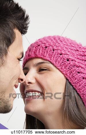 Smiling couple touching noses View Large Photo Image Stock Photography - Smiling couple touching noses. Fotosearch