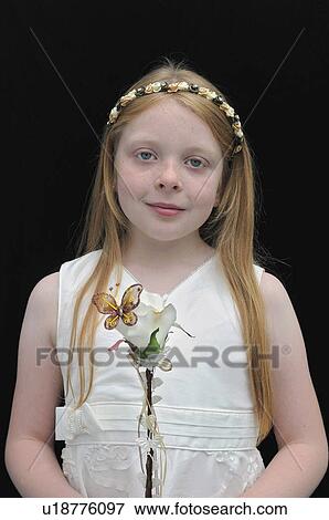Smiling flower girl in wedding View Large Photo Image Stock Photo - Smiling flower girl in wedding. Fotosearch