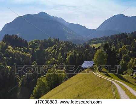 Stock Photo - Solar panel on hillside. Fotosearch