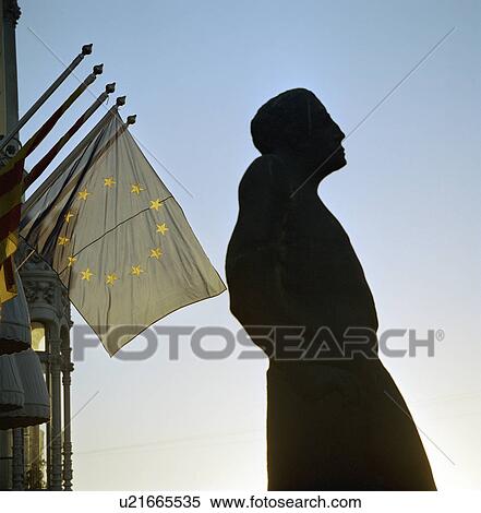 Stock Photography - Statue with European Union flag. Fotosearch