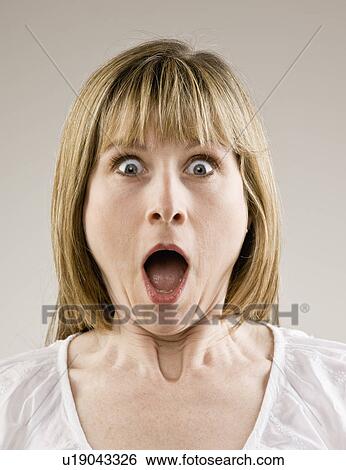 Stock Photograph - Surprised woman gasping. Fotosearch