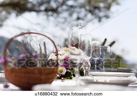 Table set with flowers and flatware View Large Photo Image Stock Image - Table set with flowers and flatware. Fotosearch
