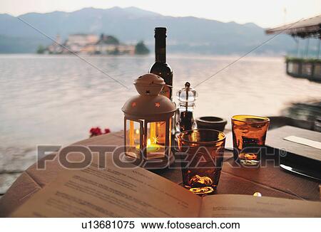 Stock Photography - Table setting at seaside restaurant. Fotosearch