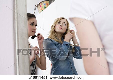 Teenage girls getting dressed up View Large Photo Image Stock Image - Teenage girls getting dressed up. Fotosearch