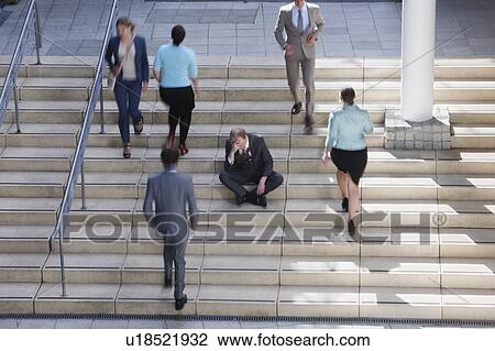 Time lapse view of depressed businessman View Large Photo Image Stock Image - Time lapse view of depressed businessman. Fotosearch