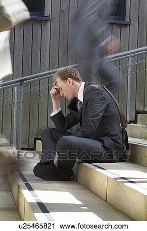 Time lapse view of depressed businessman View Large Photo Image Stock Image - Time lapse view of depressed businessman. Fotosearch