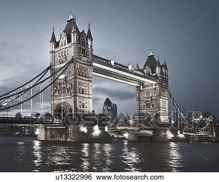 Stock Photograph - Tower Bridge lit up at night. Fotosearch