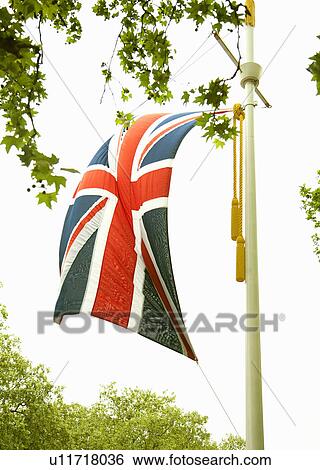 Stock Photograph - Union Jack flag on pole. Fotosearch