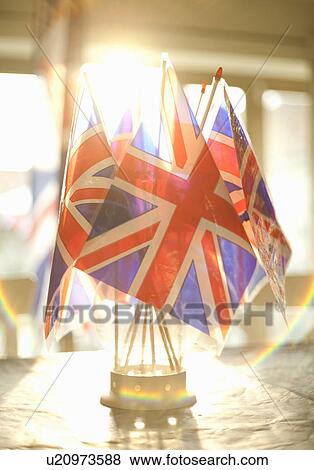 Union Jack flags in glass on table View Large Photo Image Stock Photo - Union Jack flags in glass on table. Fotosearch