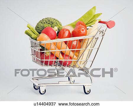 Vegetables in shopping cart View Large Photo Image Stock Photo - Vegetables in shopping cart. Fotosearch