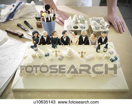 Wedding cake with top table decorations View Large Photo Image Stock Image - Wedding cake with top table decorations . Fotosearch