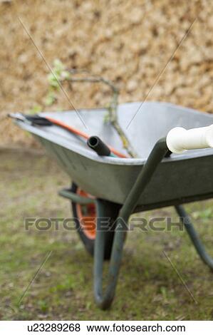 Wheelbarrow with tools View Large Photo Image Stock Photo - Wheelbarrow with tools. Fotosearch