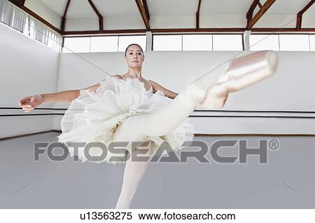 Woman in ballet costume dancing View Large Photo Image Stock Photography - Woman in ballet costume dancing. Fotosearch