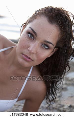 Stock Photo - Woman in bikini on beach. Fotosearch