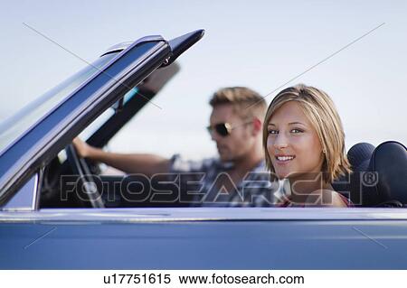 Woman riding in convertible View Large Photo Image Stock Photography - Woman riding in convertible. Fotosearch