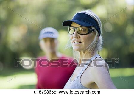 Stock Photography - Woman walking outdoors. Fotosearch