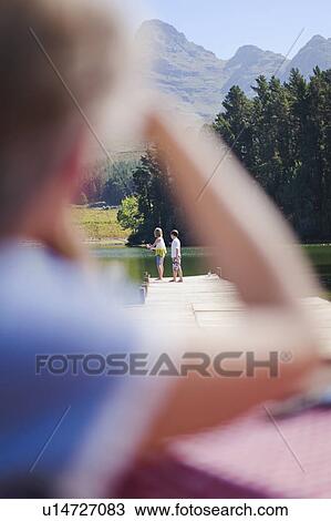 Woman watching over grandchildren View Large Photo Image Stock Image - Woman watching over grandchildren. Fotosearch