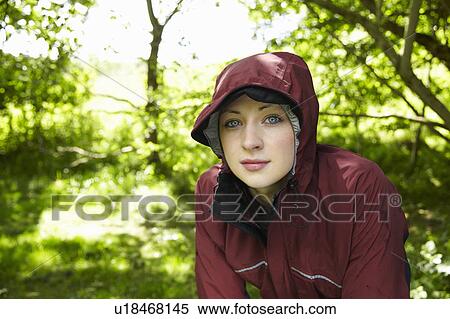 Woman wearing parka in forest View Large Photo Image Stock Photography - Woman wearing parka in forest. Fotosearch