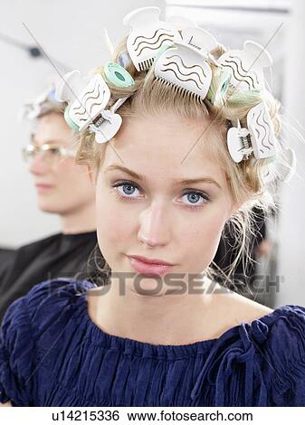 Woman wearing rollers in salon View Large Photo Image Stock Photograph - Woman wearing rollers in salon. Fotosearch