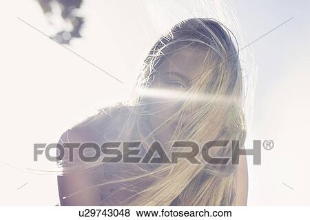 Woman’s hair covering her face View Large Photo Image Stock Photo - Woman’s hair covering her face. Fotosearch