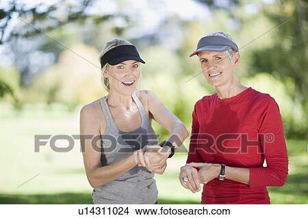 Women exercising together outdoors View Large Photo Image Picture - Women exercising together outdoors. Fotosearch