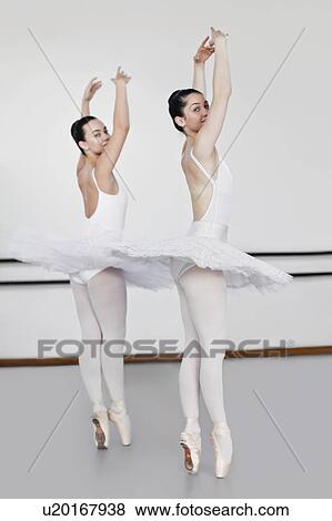 Women in ballet costumes dancing View Large Photo Image Stock Photo - Women in ballet costumes dancing. Fotosearch