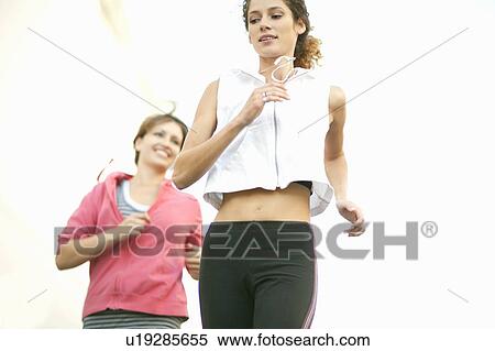 Women jogging together View Large Photo Image Stock Photography - Women jogging together. Fotosearch